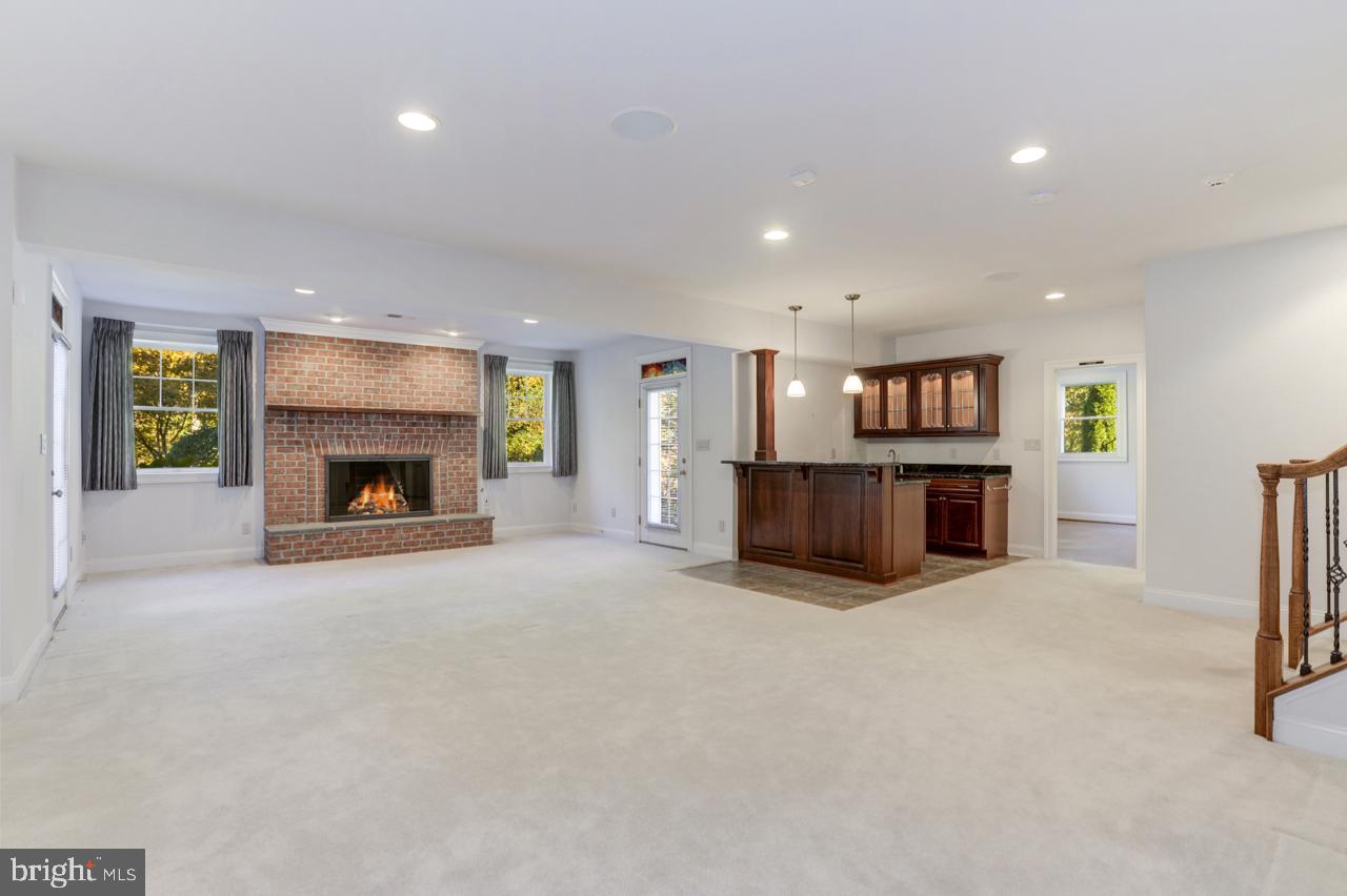 9600 Thistle Ridge Lane Vienna, VA 22182 - Photo 47 of 69 Recreation Room - Brick Fireplace