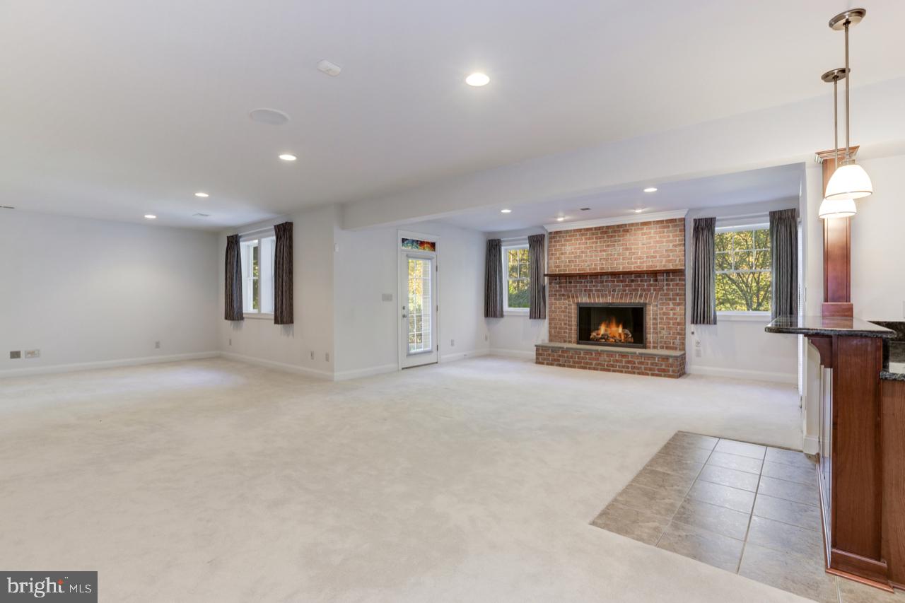 9600 Thistle Ridge Lane Vienna, VA 22182 - Photo 48 of 69 Recreation Room - 2 French Doors Open to Gardens