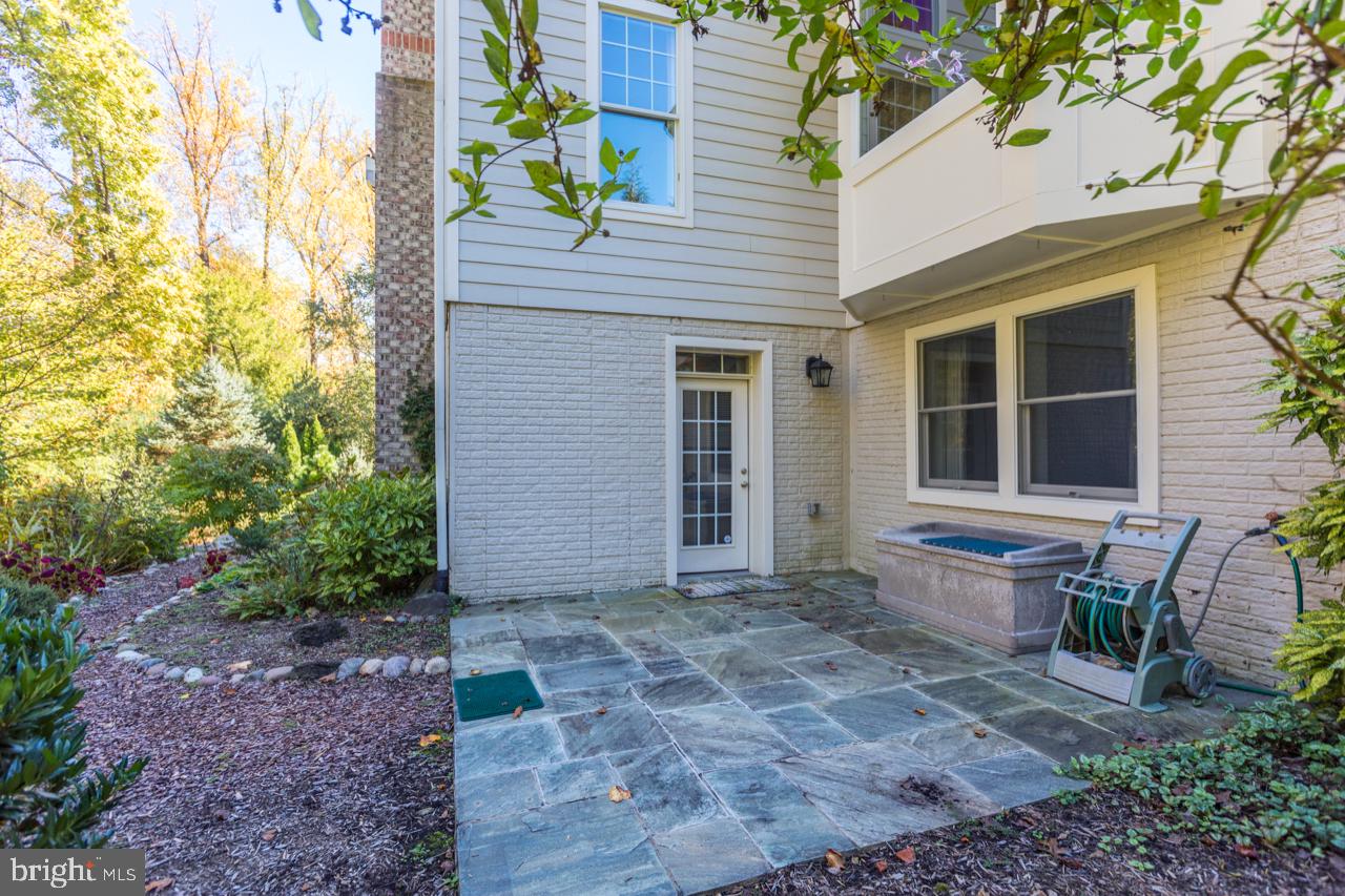 9600 Thistle Ridge Lane Vienna, VA 22182 - Photo 56 of 69 Rear Slate Patio overlooking Gardens