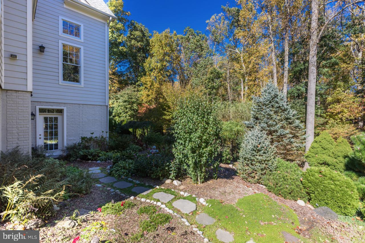 9600 Thistle Ridge Lane Vienna, VA 22182 - Photo 59 of 69 1 of 2 Exits from Lower Level to Gardens
