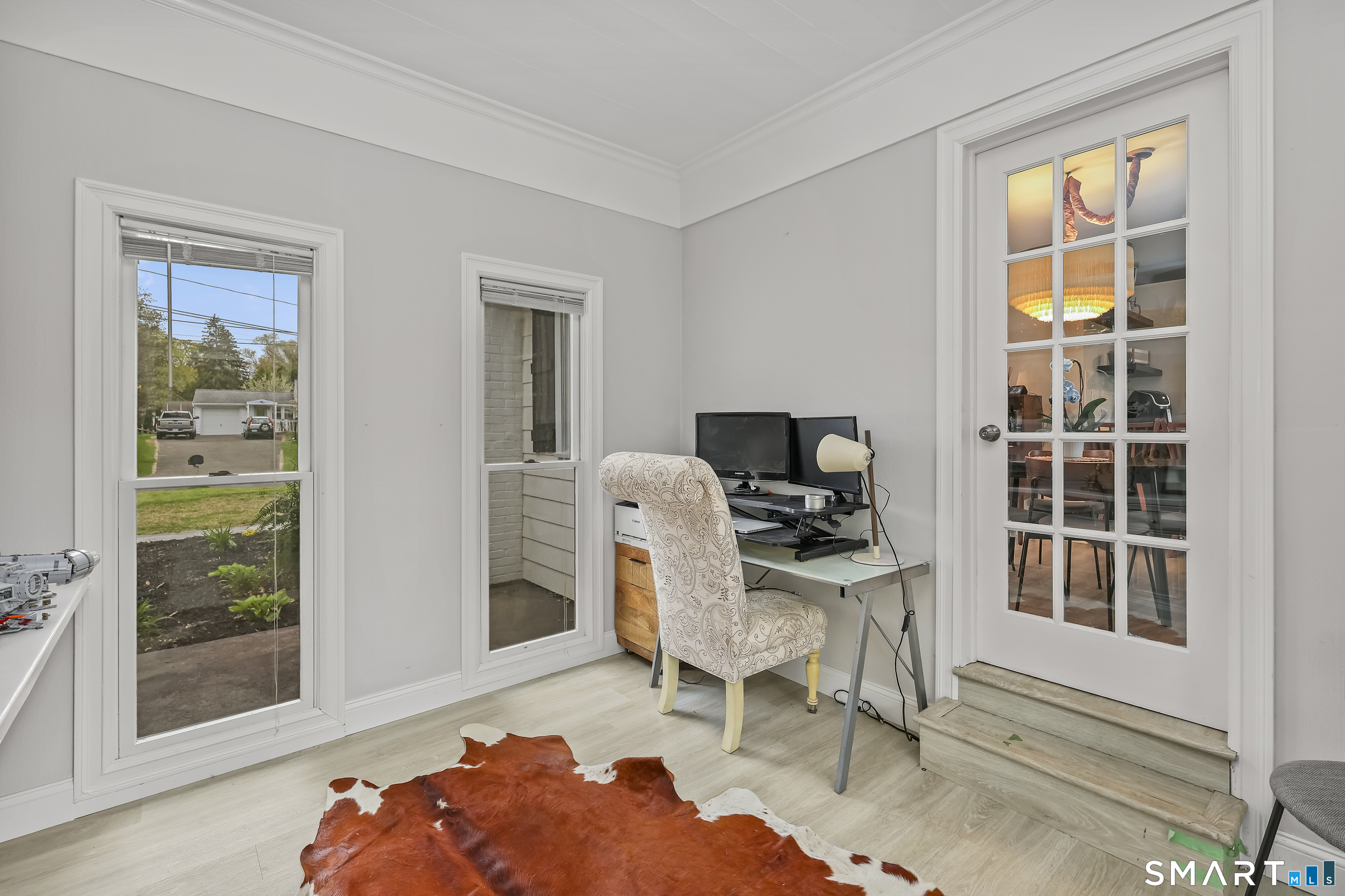 28 Kingston Road Trumbull, CT 06611 - Photo 20 of 38 Sun Room with built-ins, great space for a reading room, playroom gym, or office.