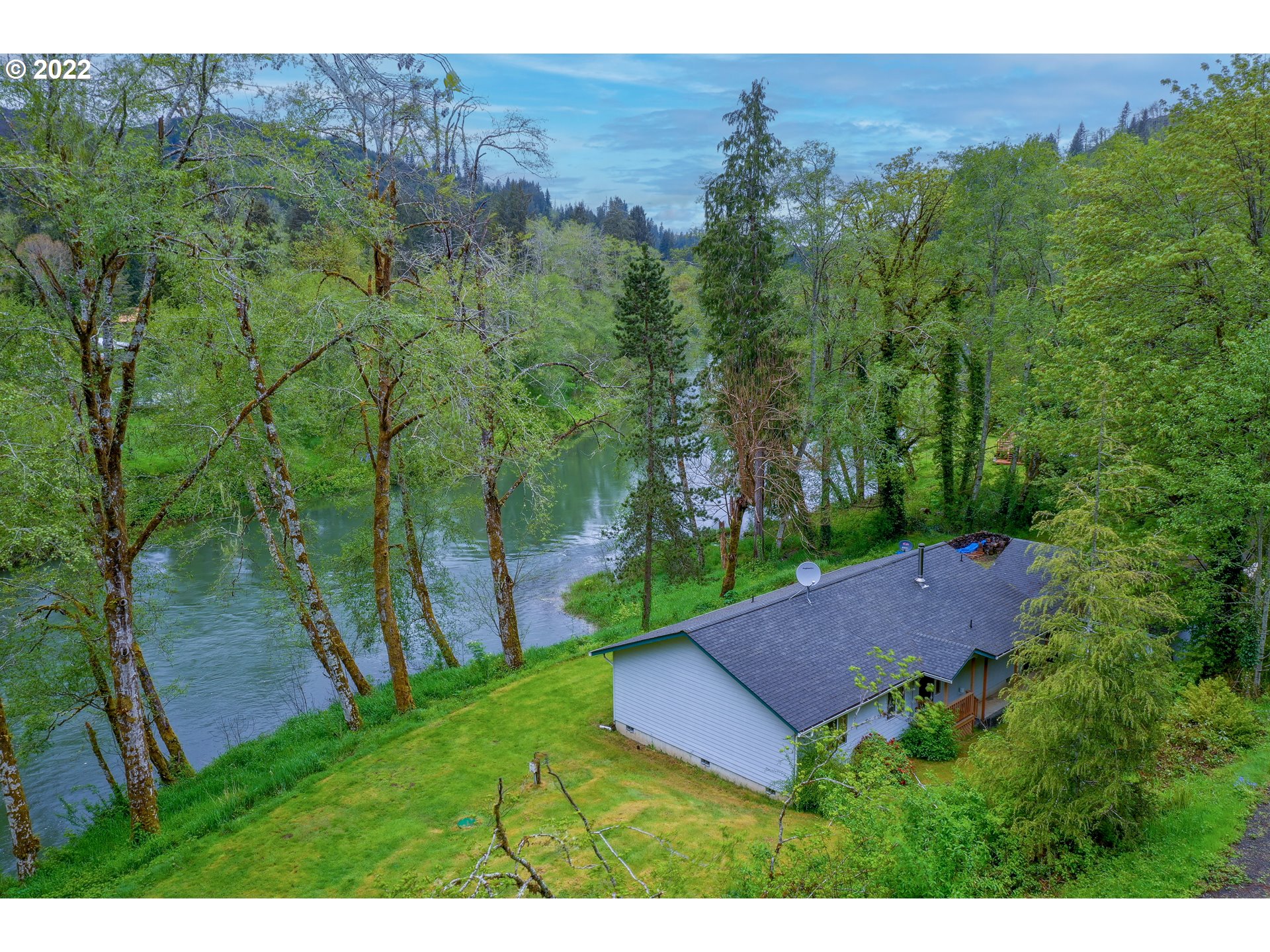 79774 Lower Nehalem Road Seaside, OR 97138 - Photo 24 of 32 an aerial view of a house with mountain view