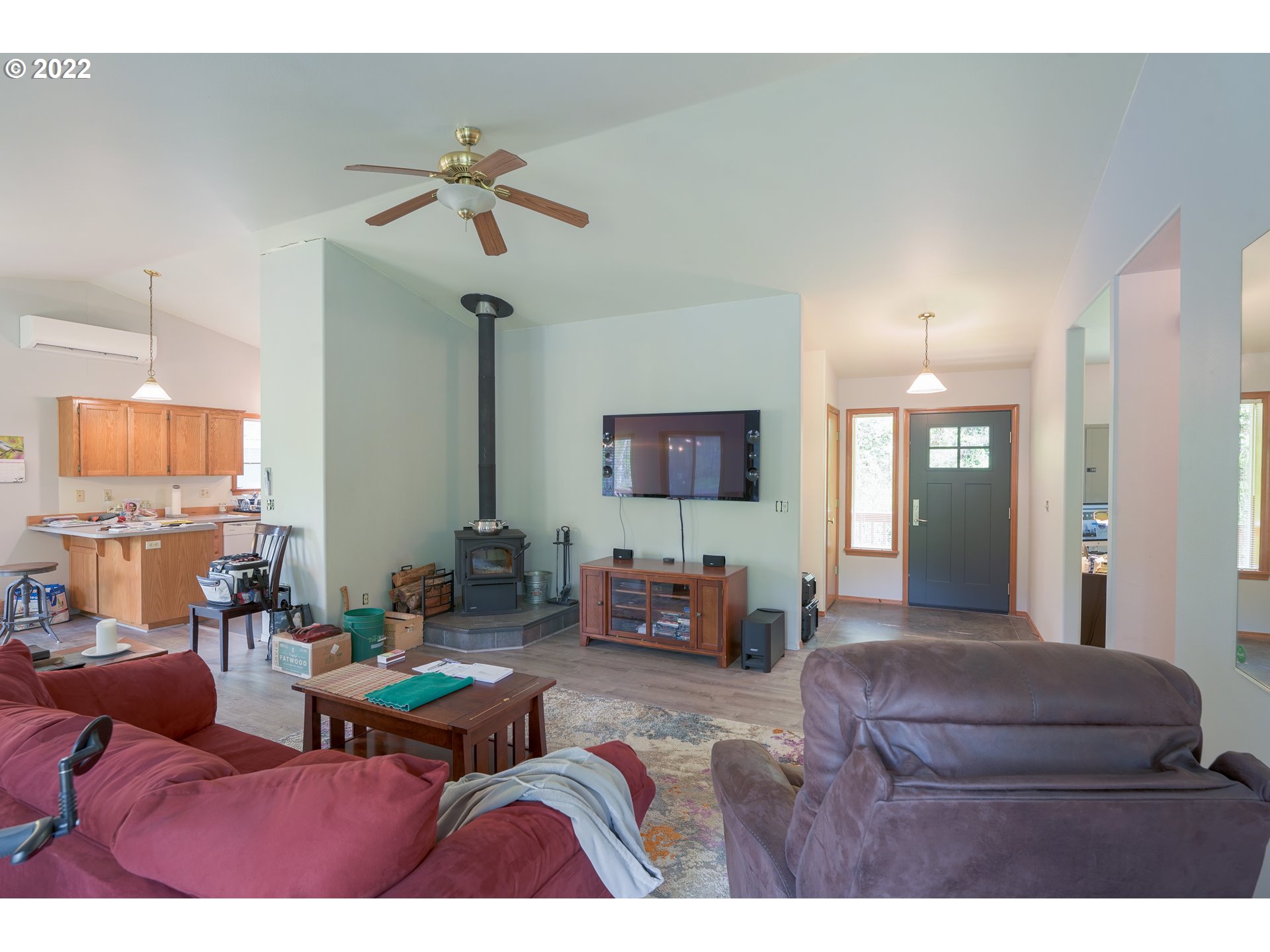 79774 Lower Nehalem Road Seaside, OR 97138 - Photo 6 of 32 a living room with furniture and a chandelier