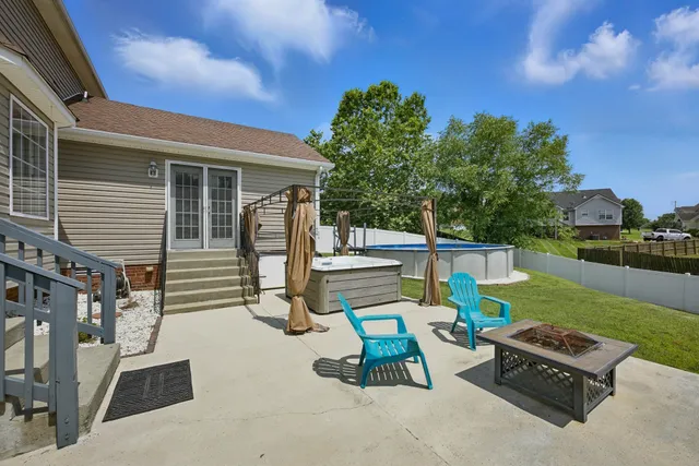 a view of a swimming pool with a lounge chairs
