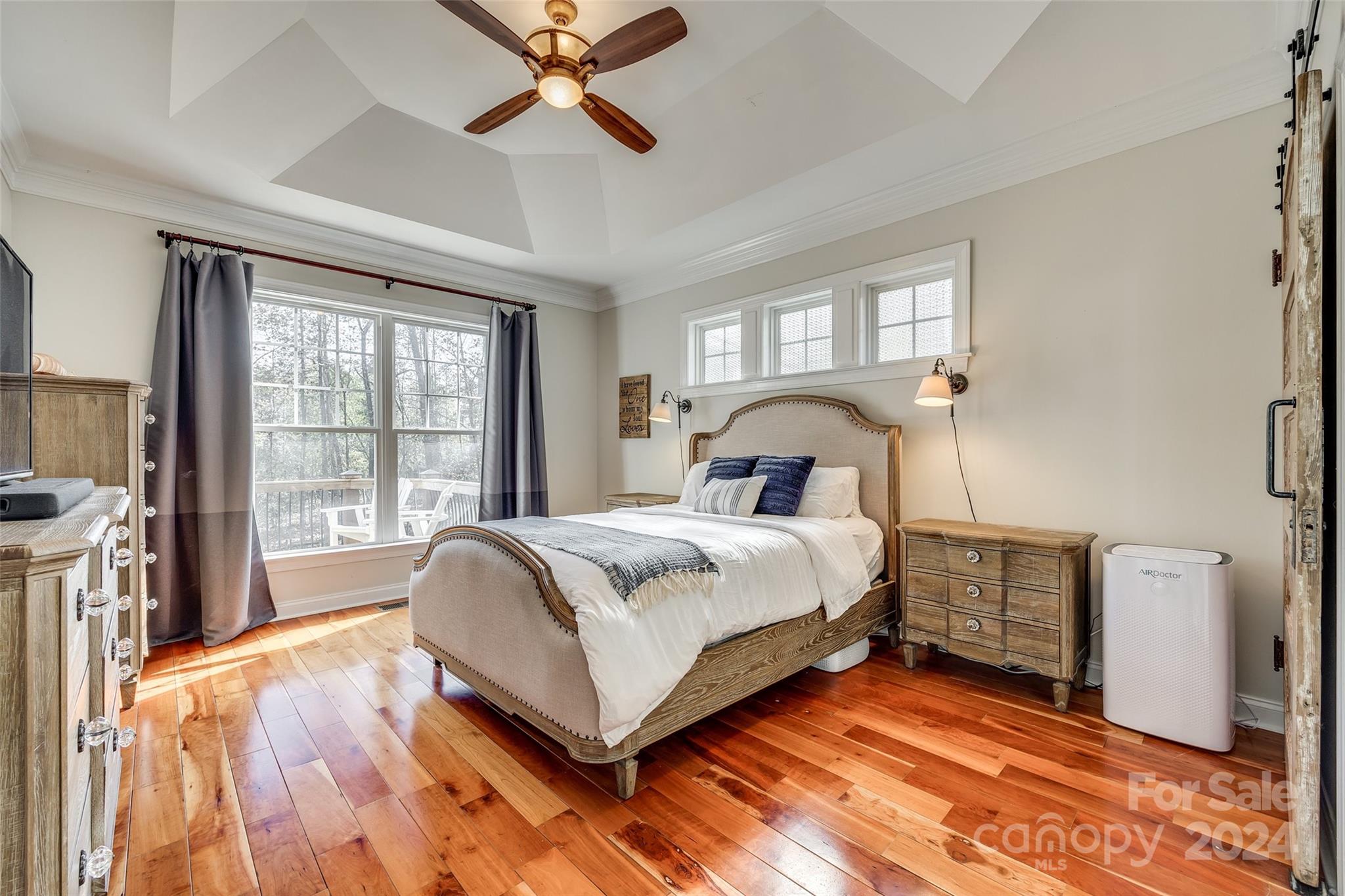 10621 Hanging Moss Trail Charlotte, NC 28227 - Photo 16 of 47 a bedroom with a bed and a large window