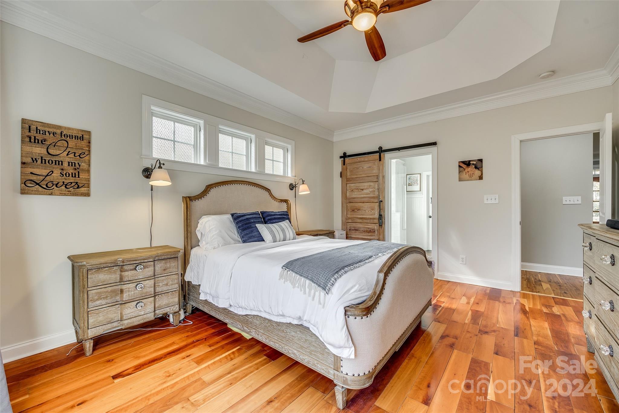 10621 Hanging Moss Trail Charlotte, NC 28227 - Photo 17 of 47 a bedroom with a bed and dresser