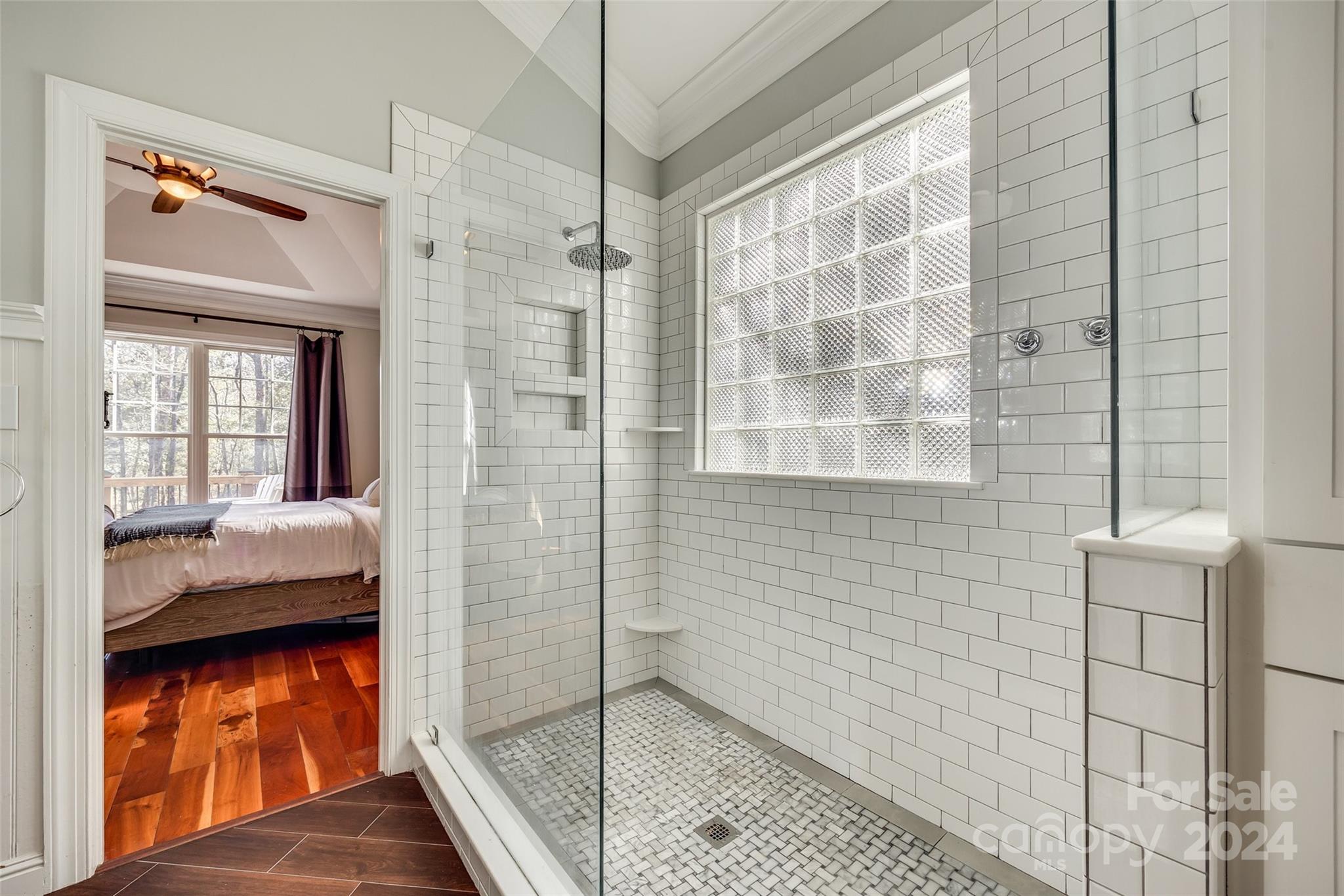 10621 Hanging Moss Trail Charlotte, NC 28227 - Photo 20 of 47 a bedroom with a bed and a window