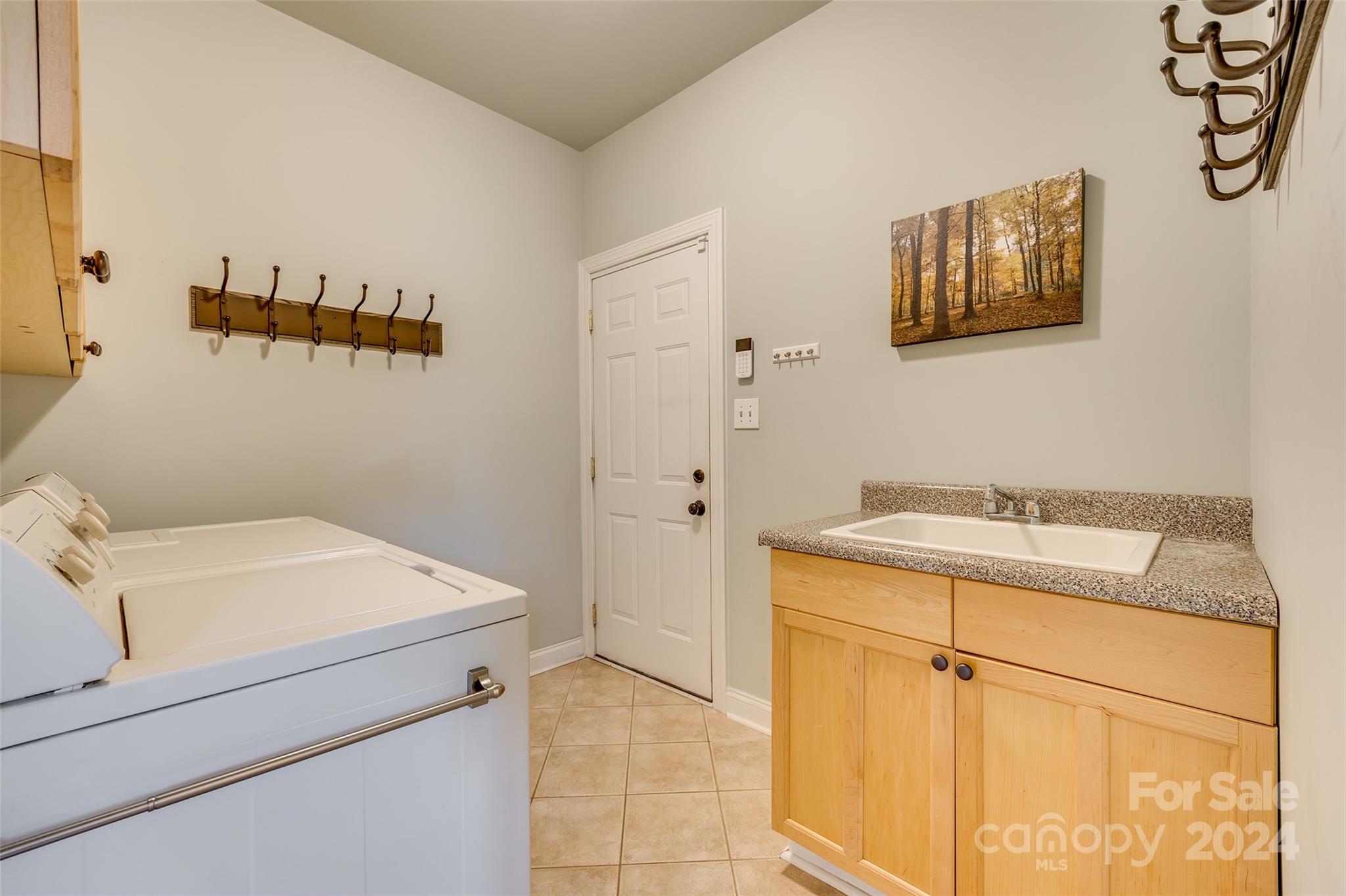 10621 Hanging Moss Trail Charlotte, NC 28227 - Photo 22 of 47 a utility room with dryer and washer