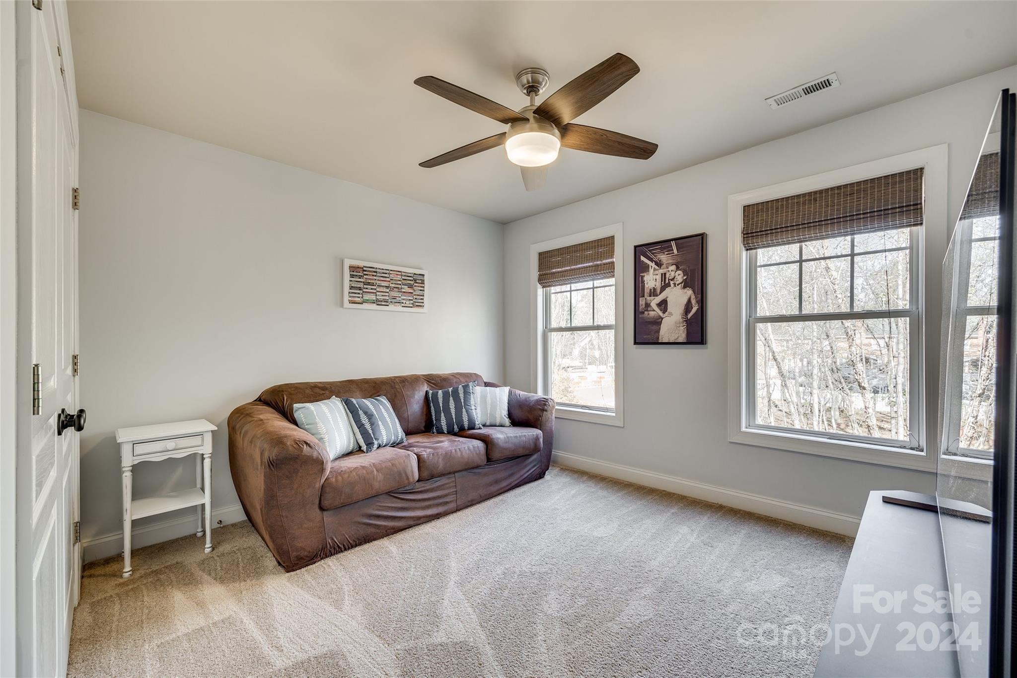 10621 Hanging Moss Trail Charlotte, NC 28227 - Photo 26 of 47 a living room with furniture and a window