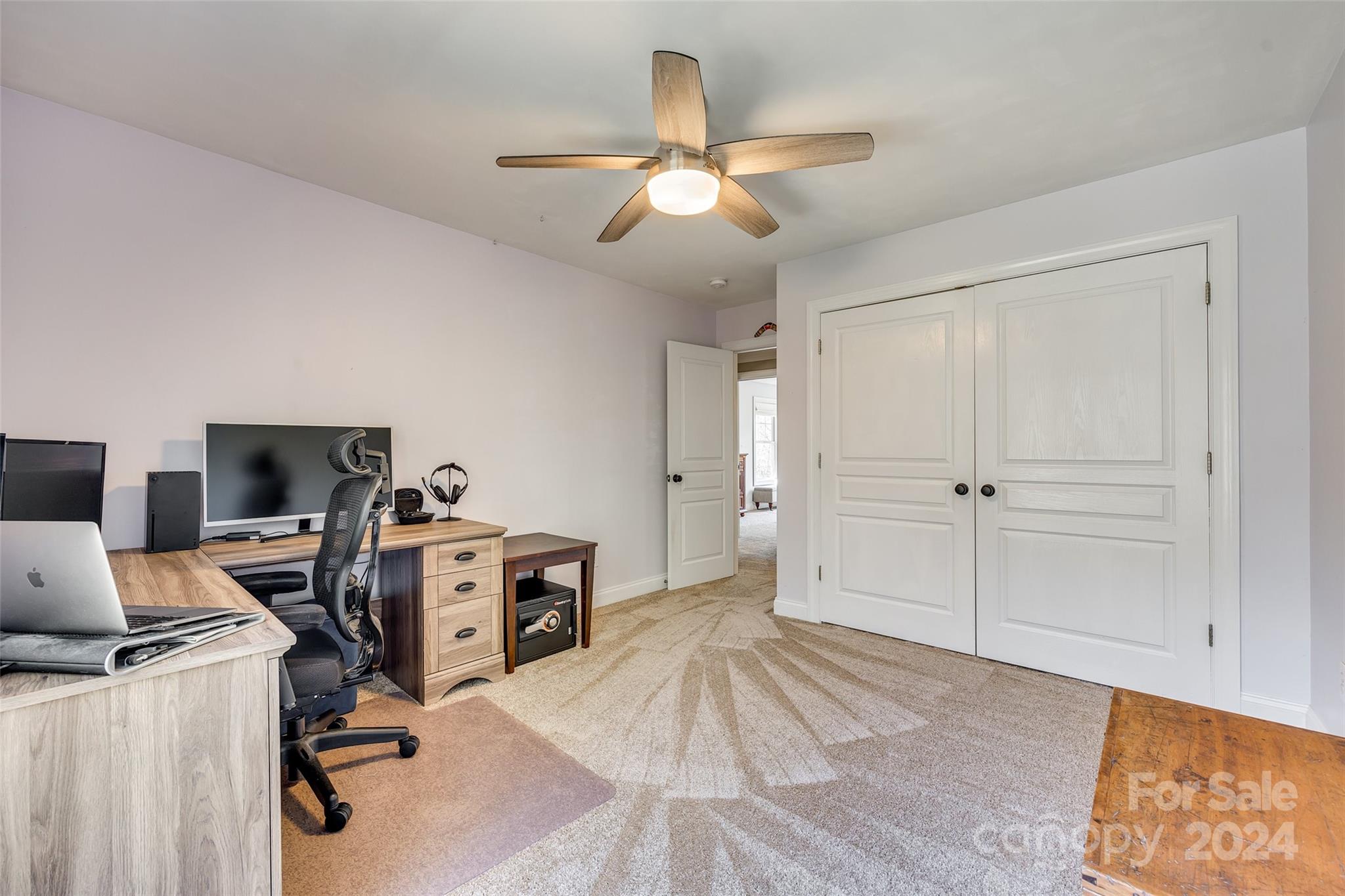10621 Hanging Moss Trail Charlotte, NC 28227 - Photo 29 of 47 a view of a workspace with furniture and a window