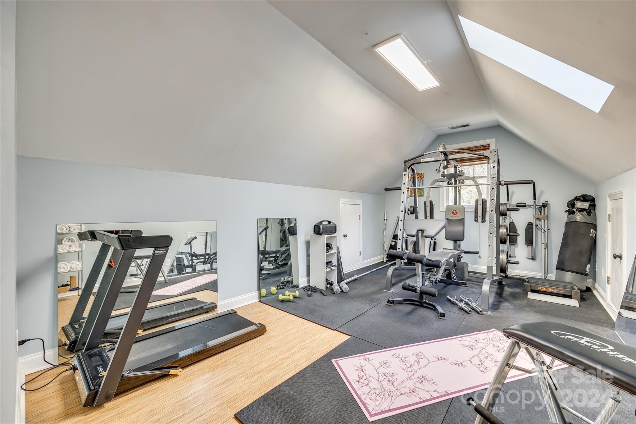 10621 Hanging Moss Trail Charlotte, NC 28227 - Photo 30 of 47 a view of a room with gym equipment