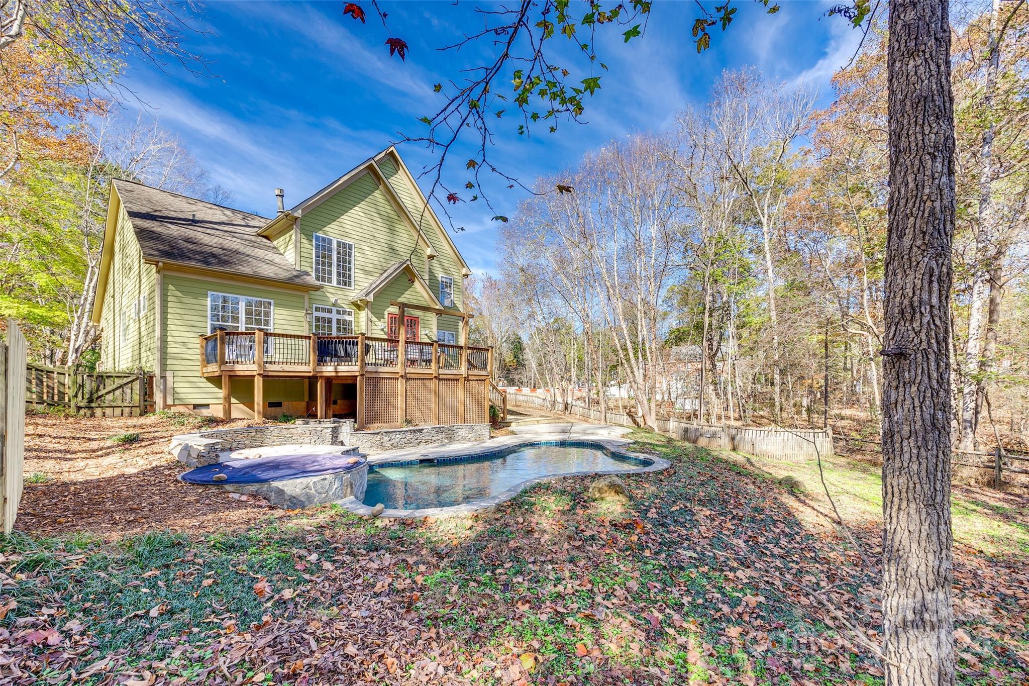 10621 Hanging Moss Trail Charlotte, NC 28227 - Photo 37 of 47 a view of a house with backyard and sitting area