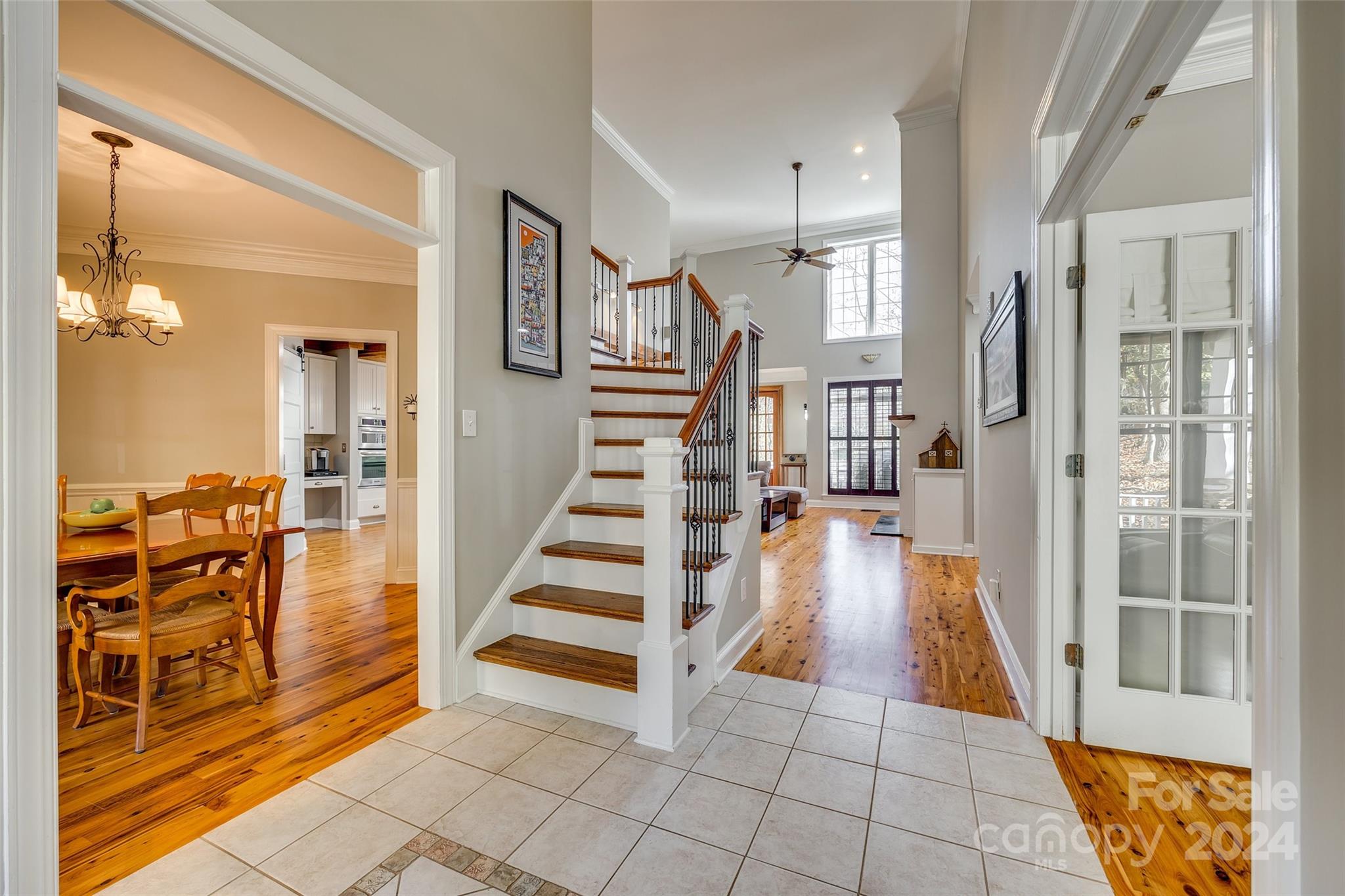 10621 Hanging Moss Trail Charlotte, NC 28227 - Photo 4 of 47 a view of a hallway with seating area