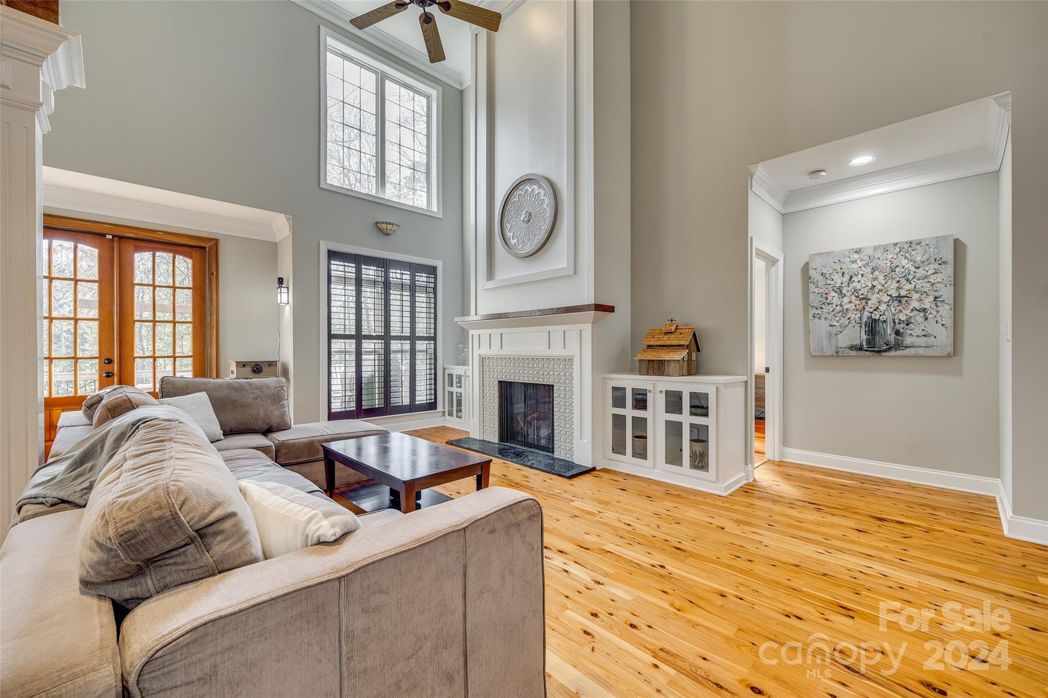 10621 Hanging Moss Trail Charlotte, NC 28227 - Photo 10 of 47 a living room with furniture fireplace and flat screen tv