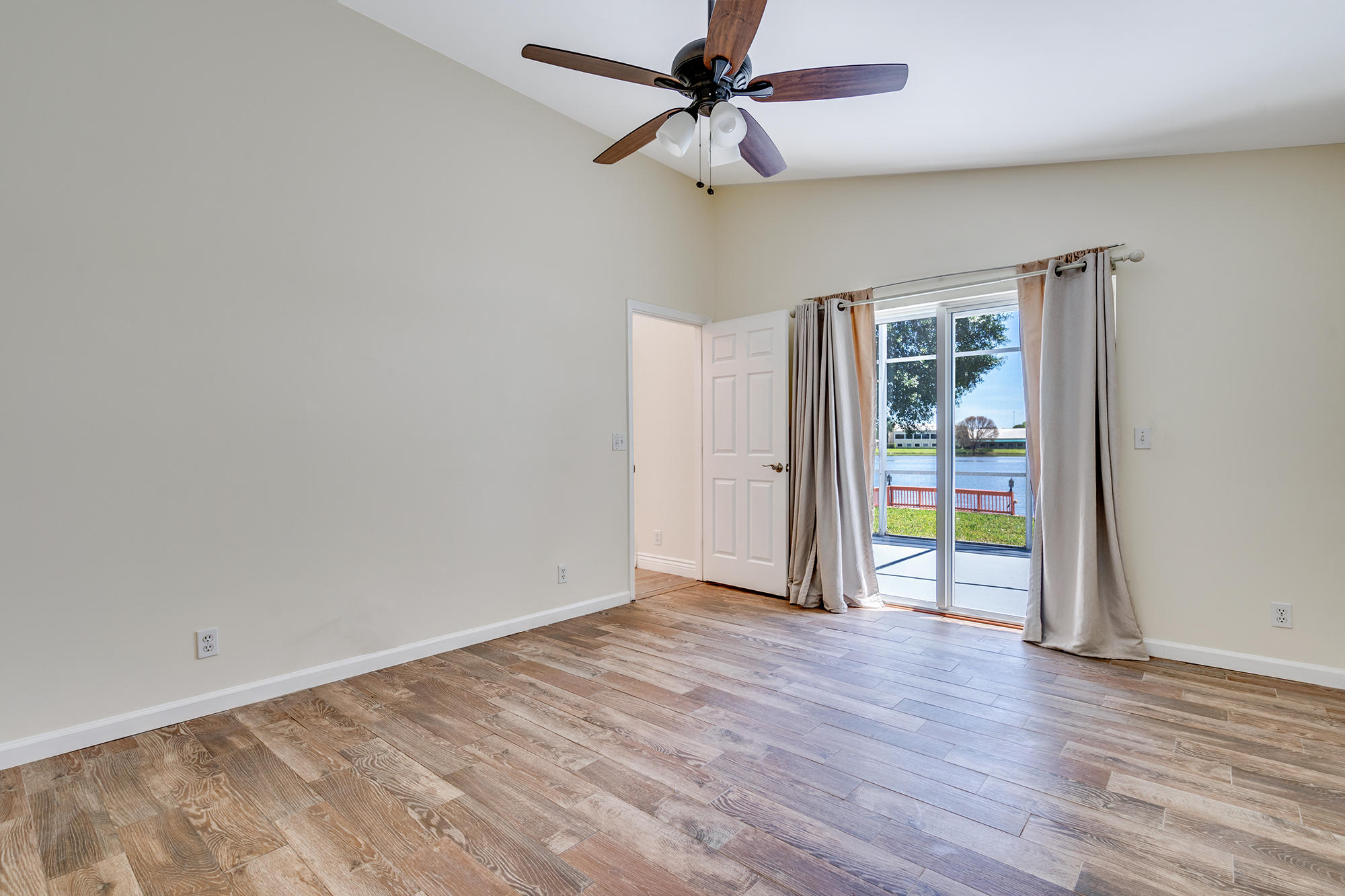 12245 Sunset Point Circle Wellington, FL 33414 - Photo 17 of 27 Master bedroom