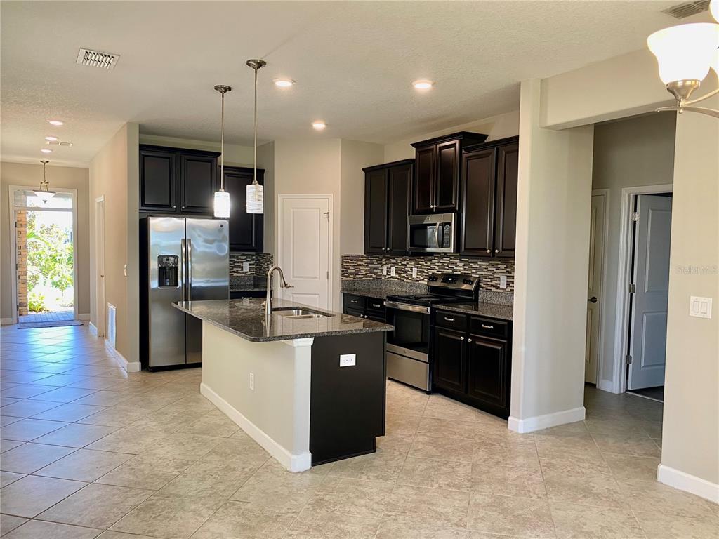 10143 Newminster Loop Ruskin, FL 33573 - Photo 4 of 25