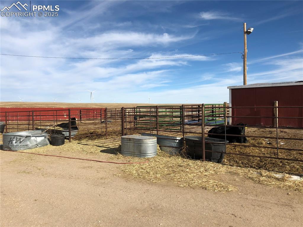 12815 Yoder Road Calhan, CO 80808 - Photo 13 of 19 a view of a terrace with lawn chairs