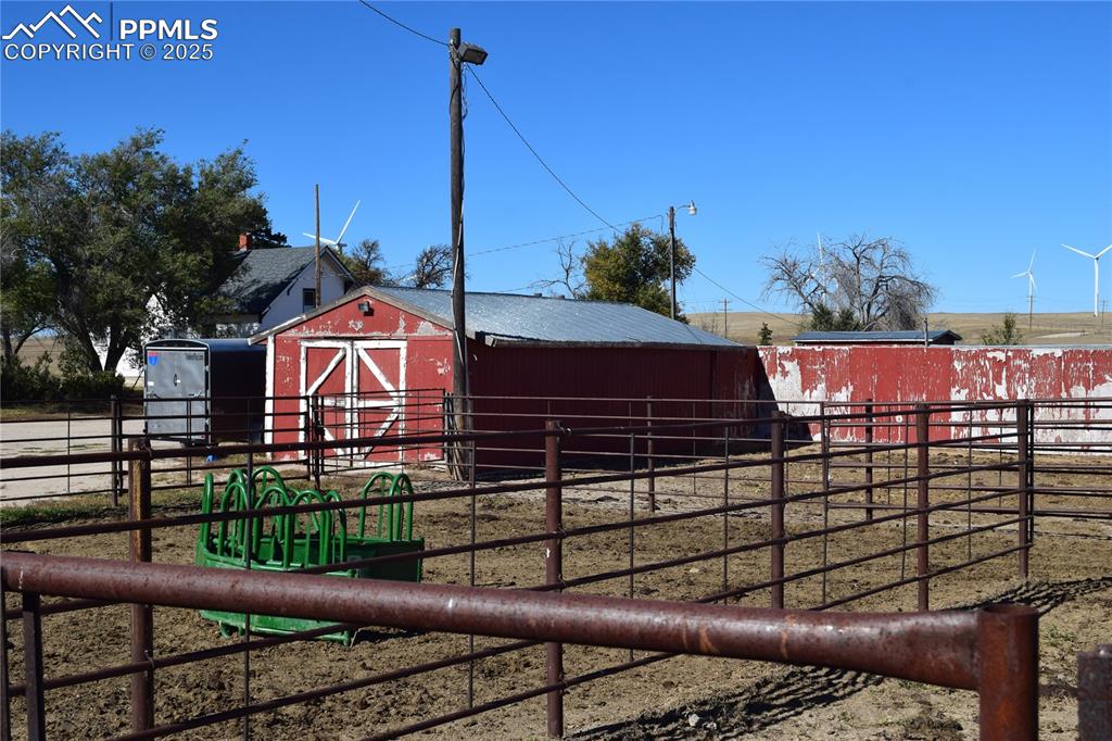 12815 Yoder Road Calhan, CO 80808 - Photo 16 of 19 a view of a yard with an outdoor seating