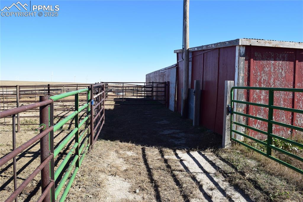 12815 Yoder Road Calhan, CO 80808 - Photo 17 of 19 a view of a house with wooden fence