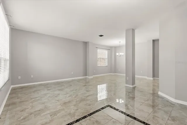 an empty room with windows