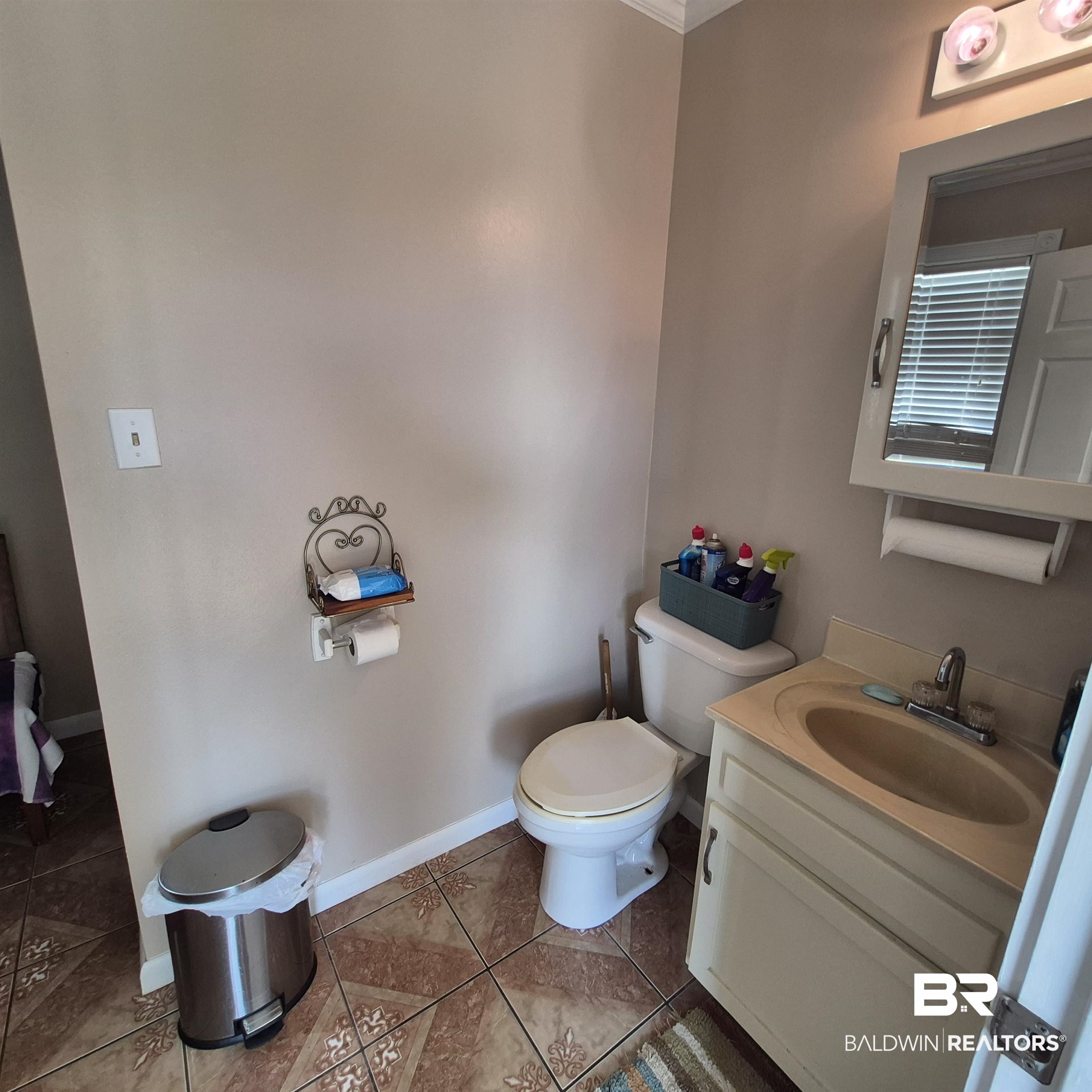 26635 Highway 41 Range, AL 36473 - Photo 40 of 74 Half bath with vanity and tile patterned floors