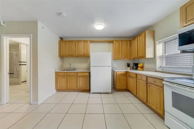 a view of a livingroom with wooden floor