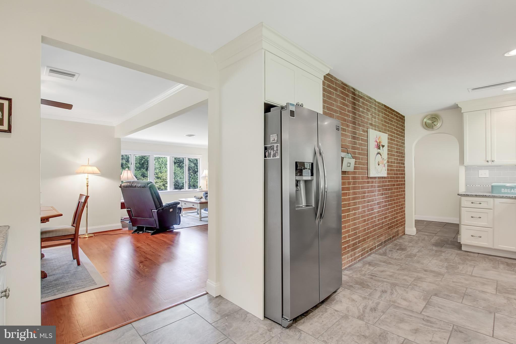 13400 Blythenia Road Phoenix, MD 21131 - Photo 13 of 25 a kitchen with stainless steel appliances a refrigerator and a stove