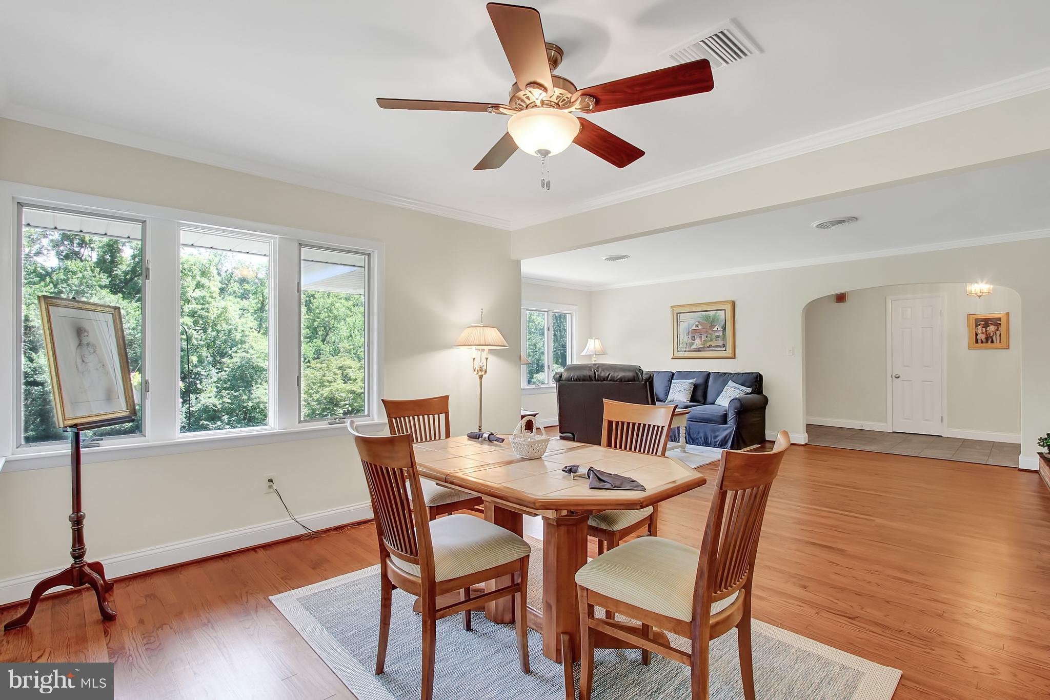 13400 Blythenia Road Phoenix, MD 21131 - Photo 7 of 25 a view of a dining room with furniture window and wooden floor