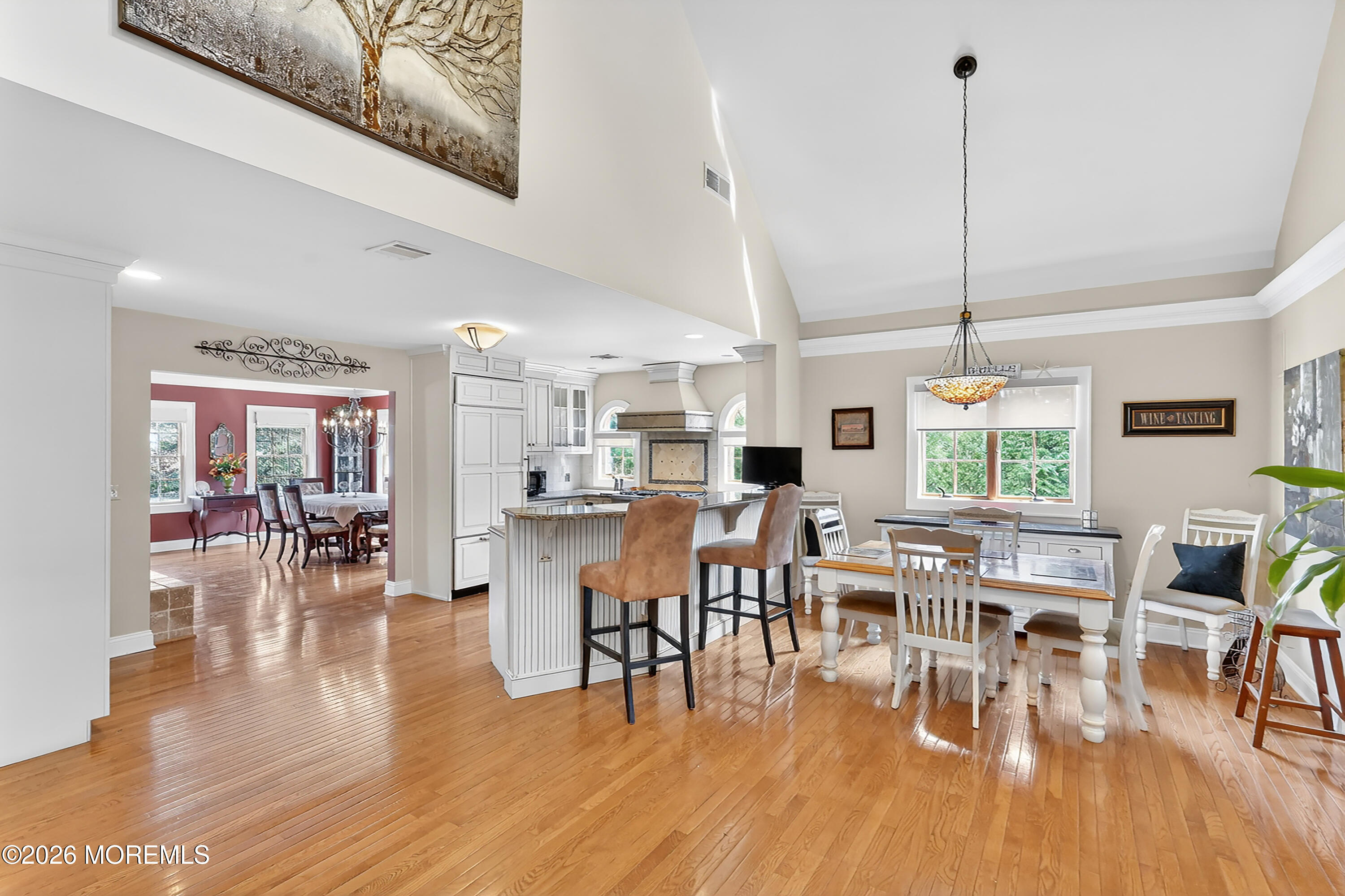 617 Oceanview Road Brielle, NJ 08730 - Photo 18 of 94 a room with lots of furniture and a wooden floor