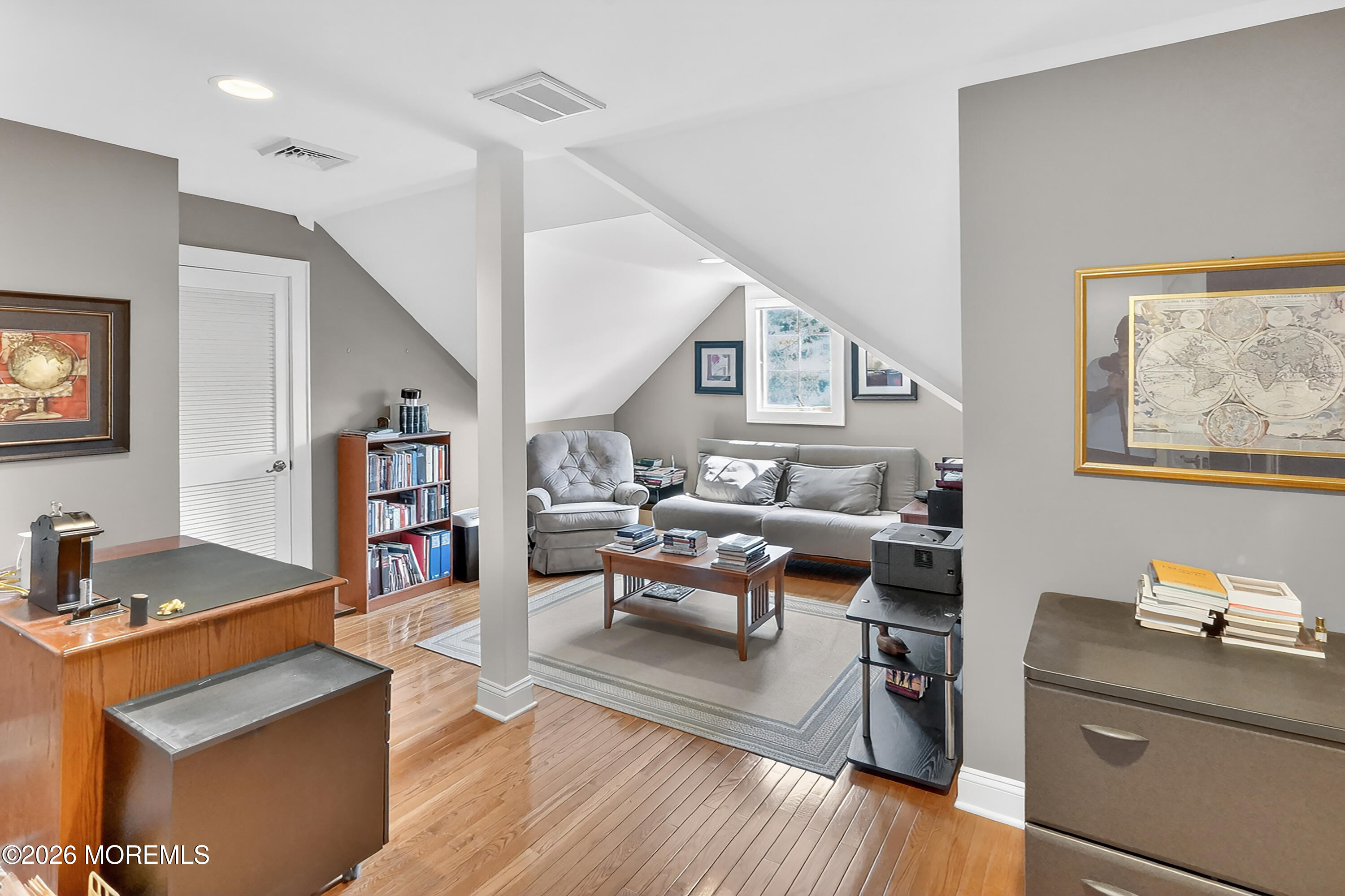 617 Oceanview Road Brielle, NJ 08730 - Photo 31 of 94 a living room with furniture and a wooden floor