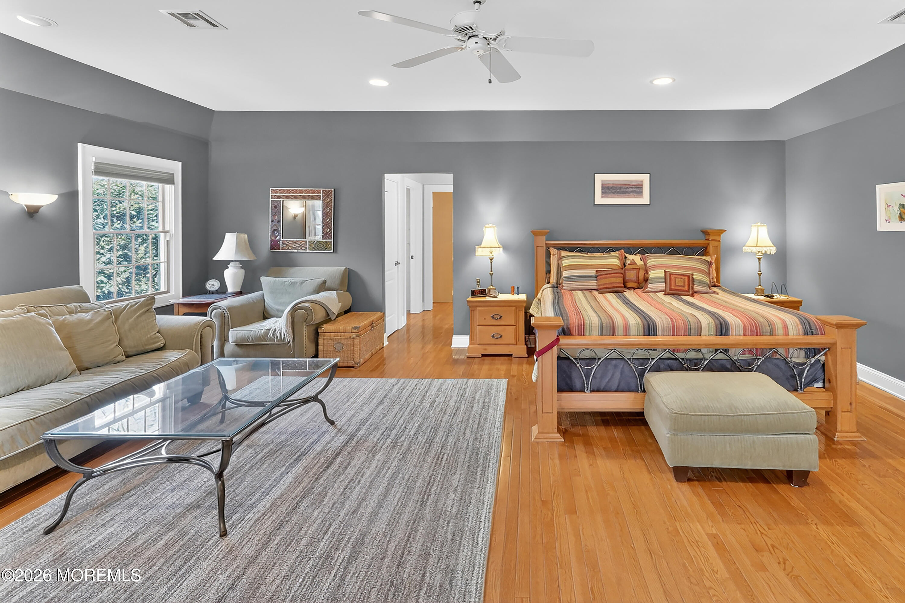 617 Oceanview Road Brielle, NJ 08730 - Photo 37 of 94 a living room with furniture and a wooden floor