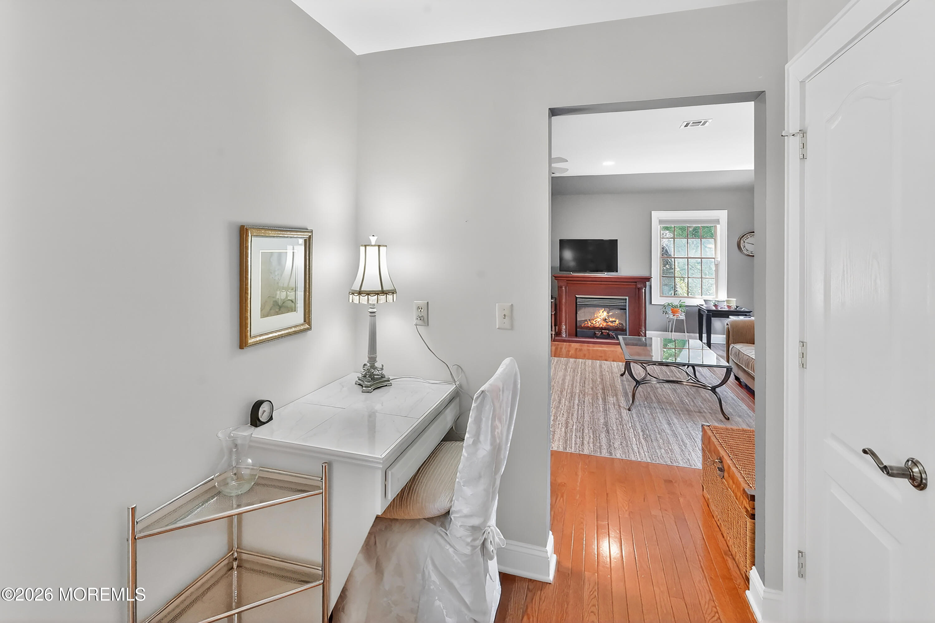 617 Oceanview Road Brielle, NJ 08730 - Photo 41 of 94 a living room with furniture and a wooden floor