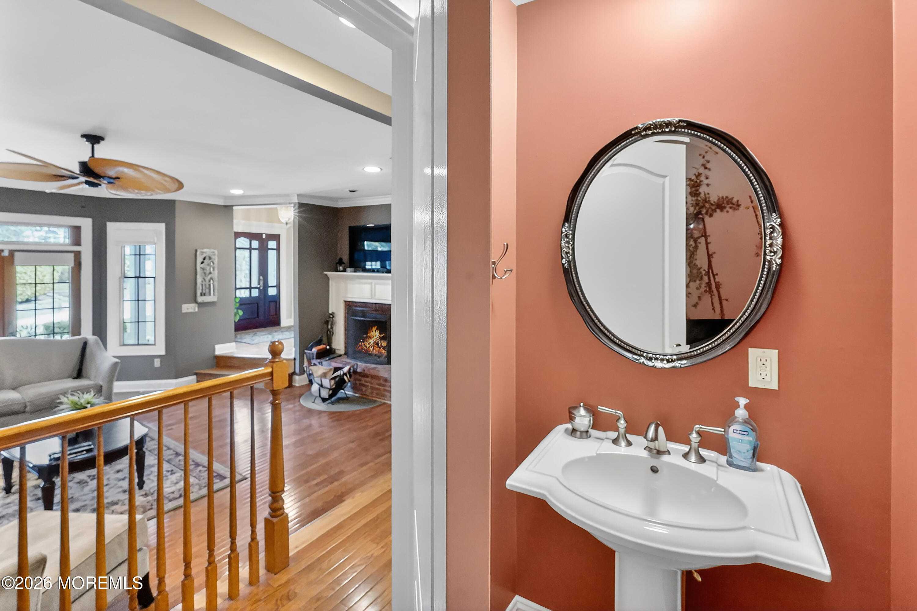 617 Oceanview Road Brielle, NJ 08730 - Photo 50 of 94 a bathroom with a sink a mirror and a bathtub