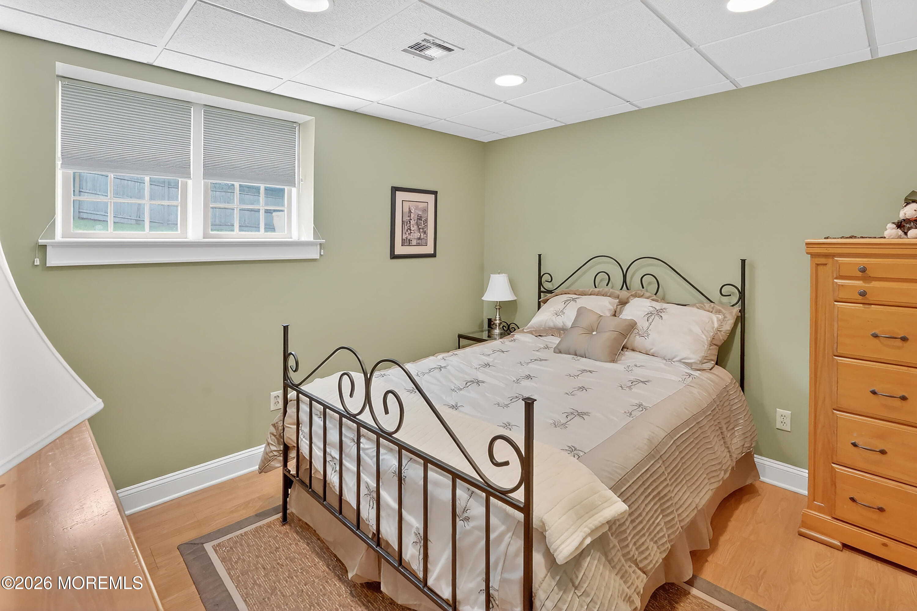 617 Oceanview Road Brielle, NJ 08730 - Photo 57 of 94 a bedroom with a bed and a window