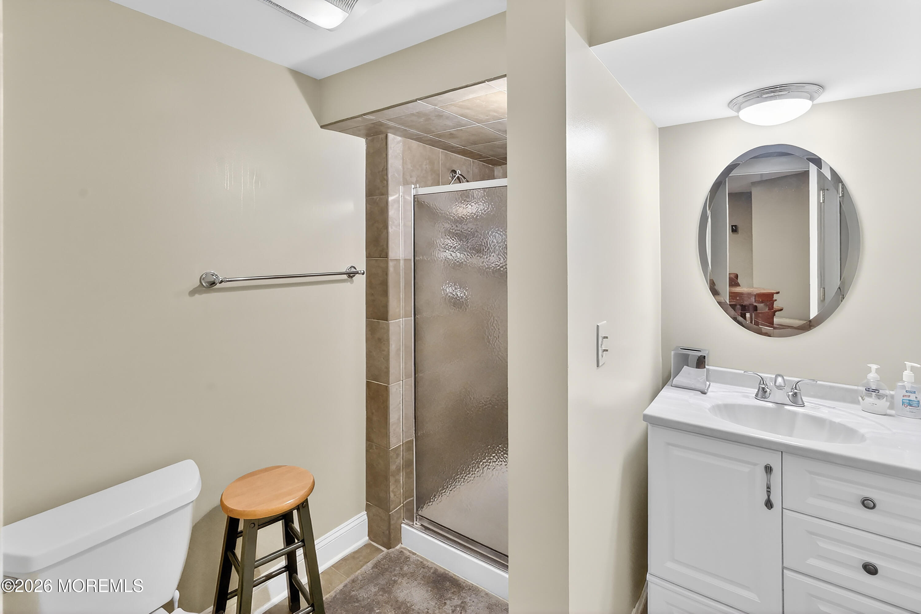 617 Oceanview Road Brielle, NJ 08730 - Photo 58 of 94 a bathroom with a sink and a mirror