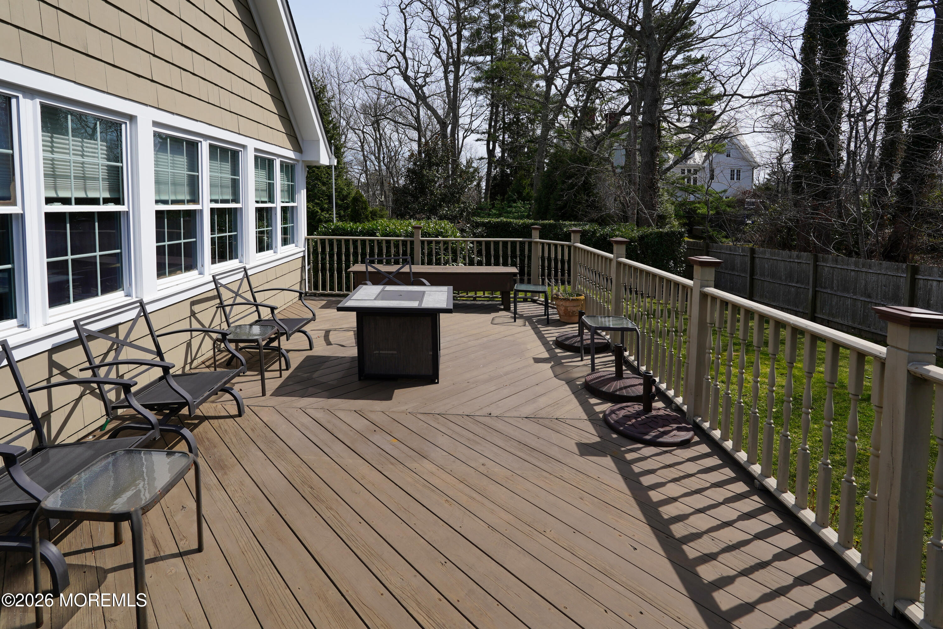 617 Oceanview Road Brielle, NJ 08730 - Photo 66 of 94 a view of balcony with wooden floor and seating