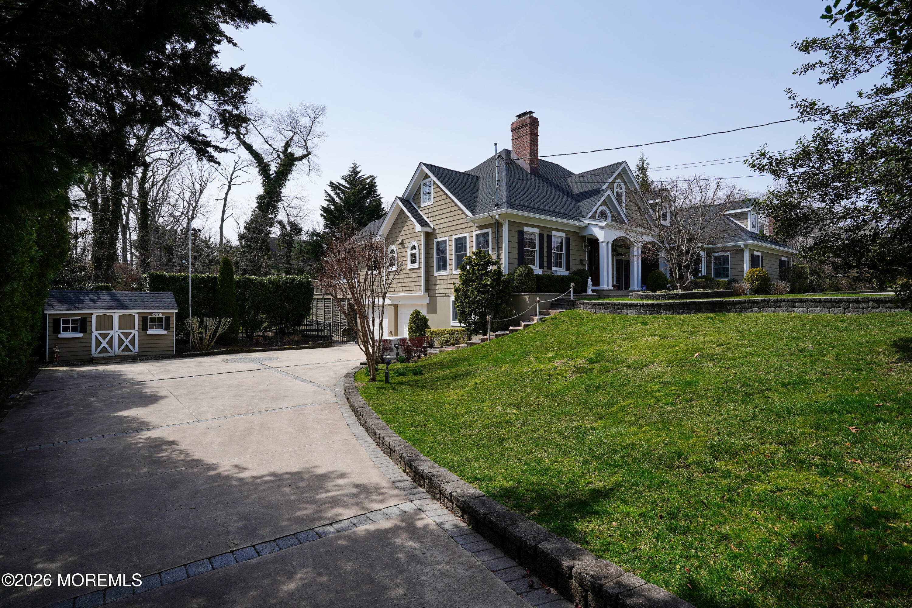 617 Oceanview Road Brielle, NJ 08730 - Photo 69 of 94 a front view of a house with a yard