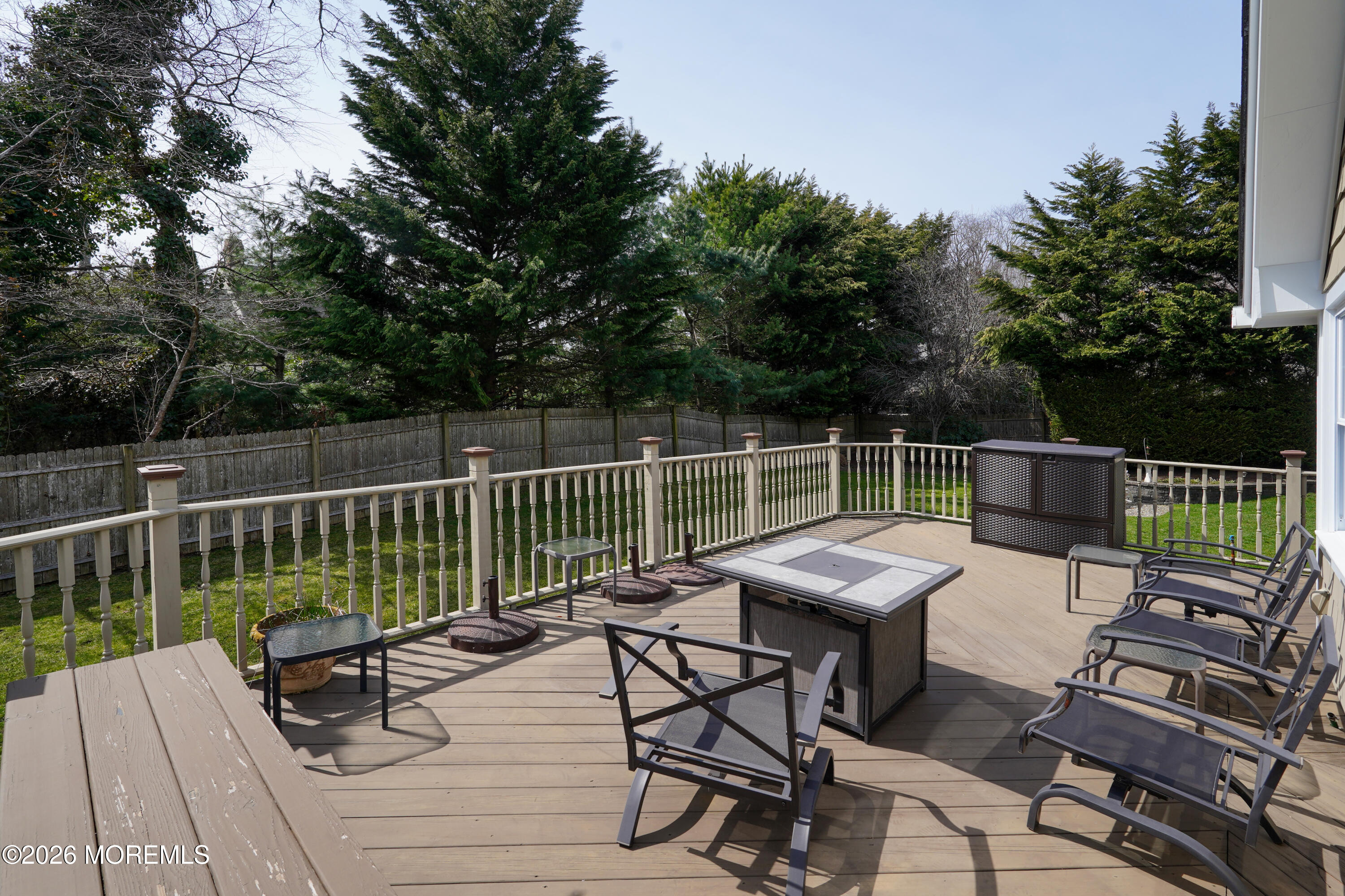 617 Oceanview Road Brielle, NJ 08730 - Photo 73 of 94 a view of a chairs and table on the deck