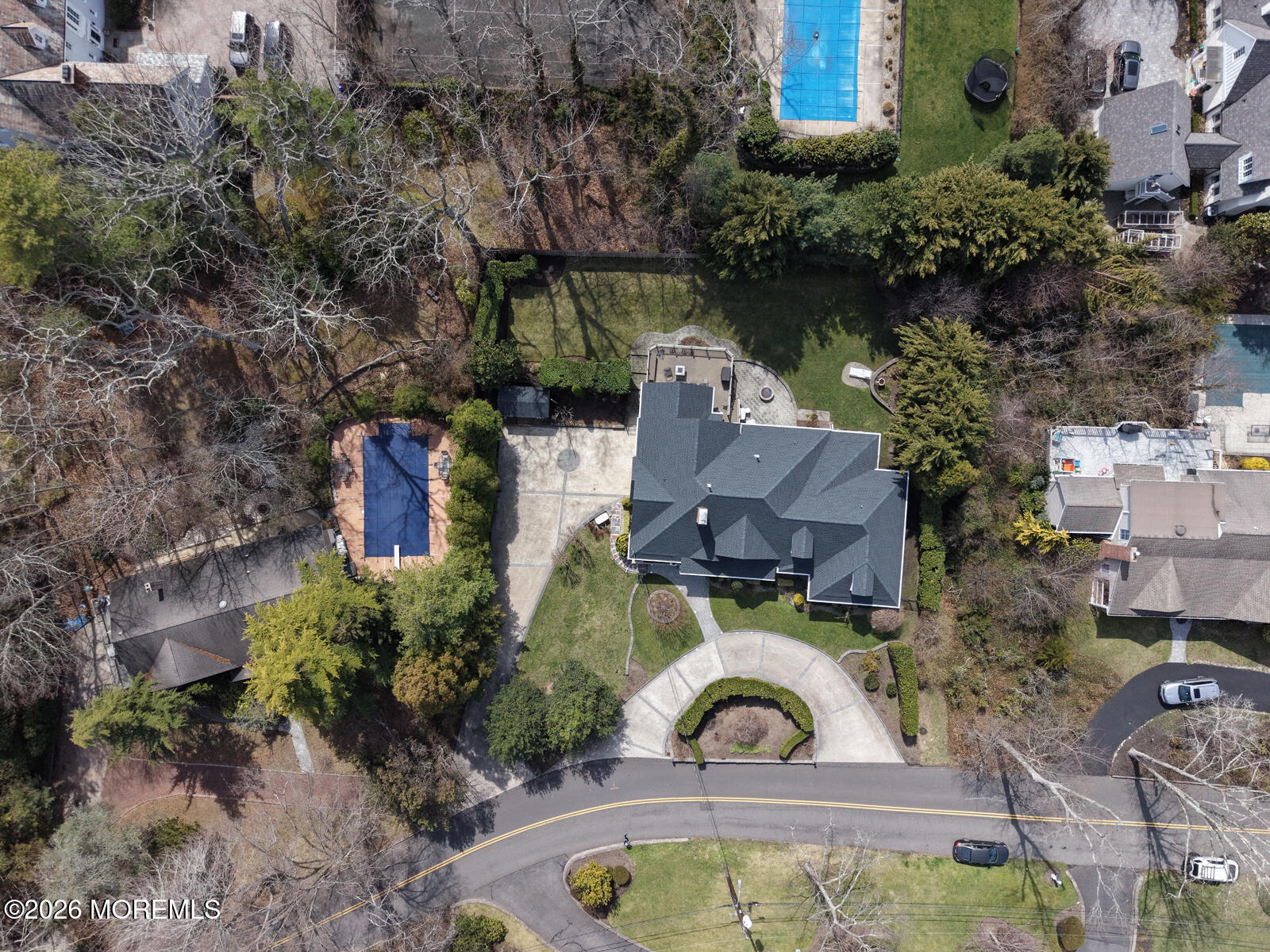 617 Oceanview Road Brielle, NJ 08730 - Photo 90 of 94 an aerial view of a house with swimming pool and a yard