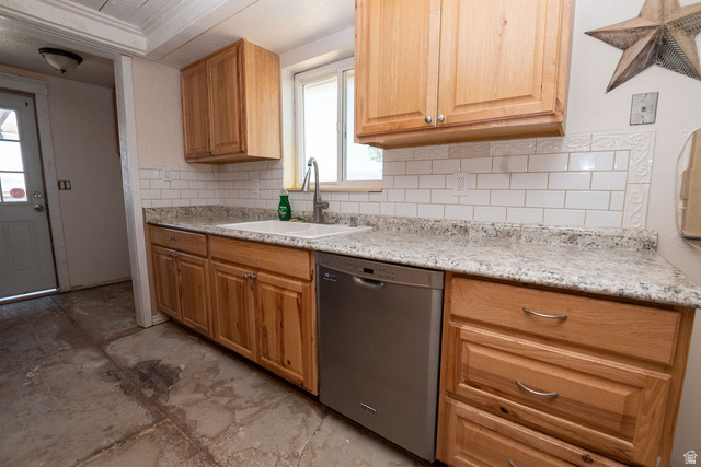 570 West Main Street Beaver, UT 84713 - Photo 9 of 43 Light wood-finish cabinetry featuring a light-toned countertop