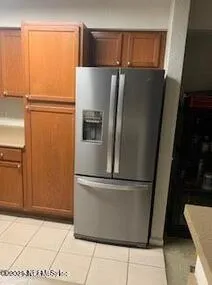 a kitchen with a sink a stove and cabinets