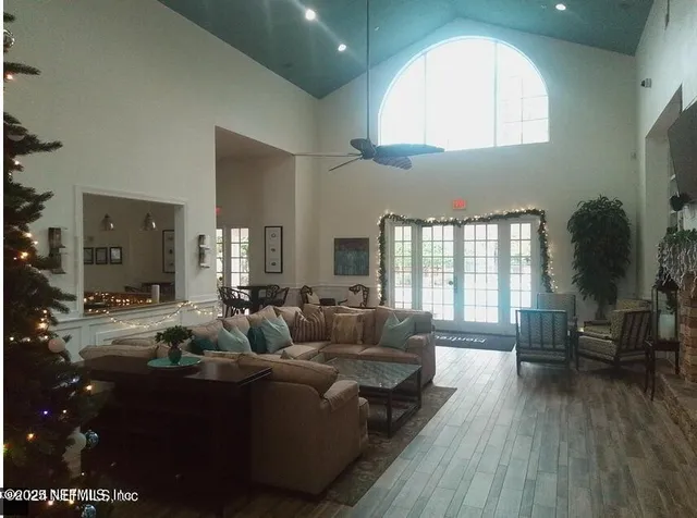 a room with furniture and wooden floor