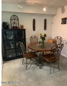 a bath tub sitting next to a shower