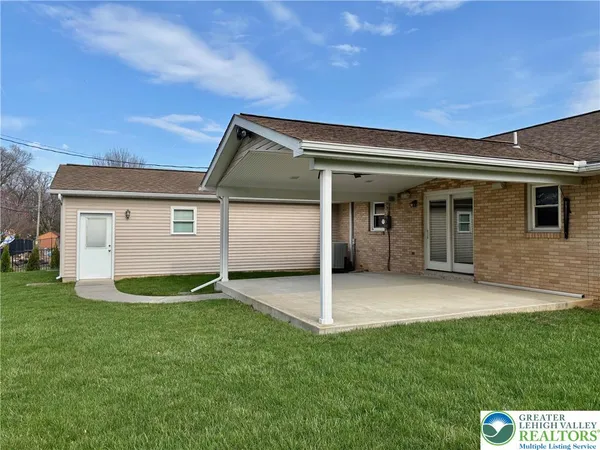 a front view of house with yard