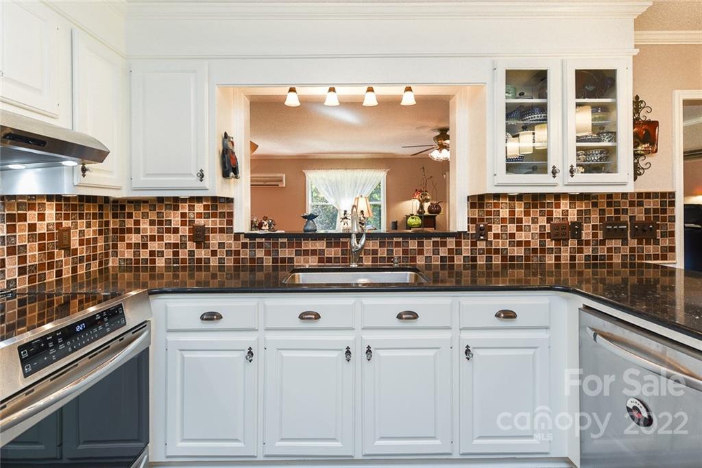 12867 Hamilton Pl Drive Fort Mill, SC 29708 - Photo 11 of 45 a kitchen with white cabinets and appliances
