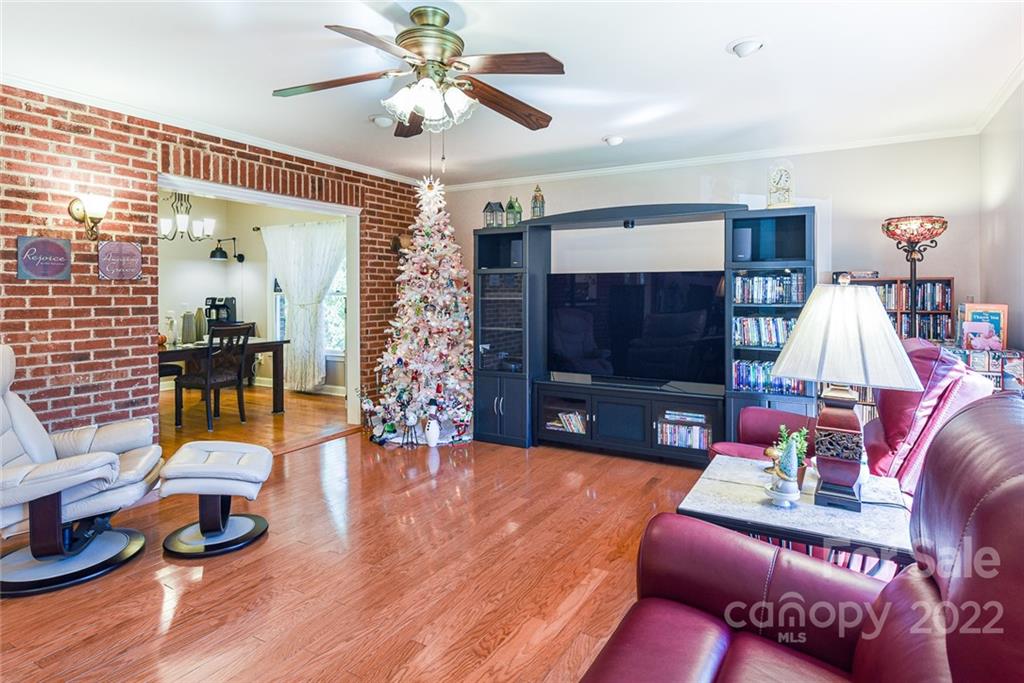 12867 Hamilton Pl Drive Fort Mill, SC 29708 - Photo 14 of 45 a living room with furniture and a flat screen tv
