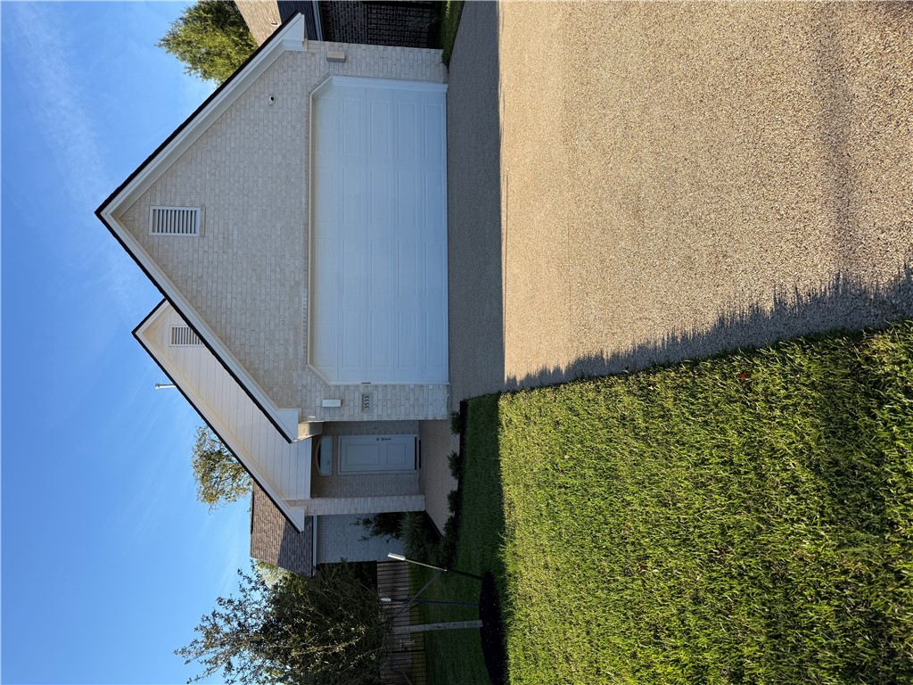 a front view of house with yard