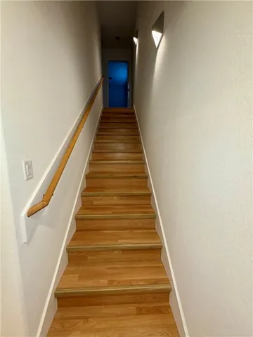a view of storage and utility room with washer and dryer