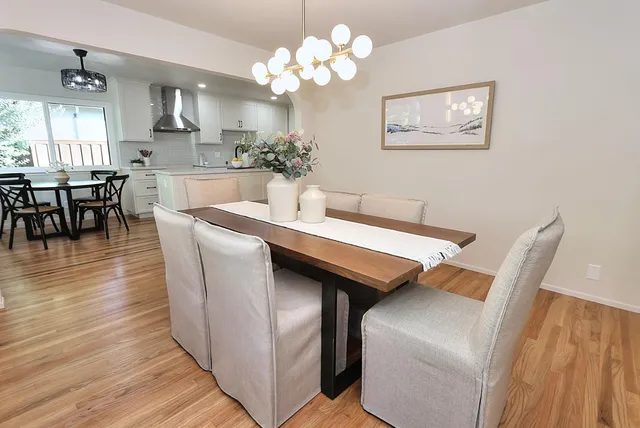a kitchen with a sink stove and refrigerator
