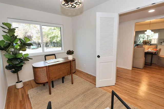 a view of empty room with windows